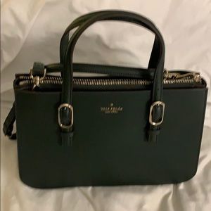 Green Kate spade Tote with cross body strap.